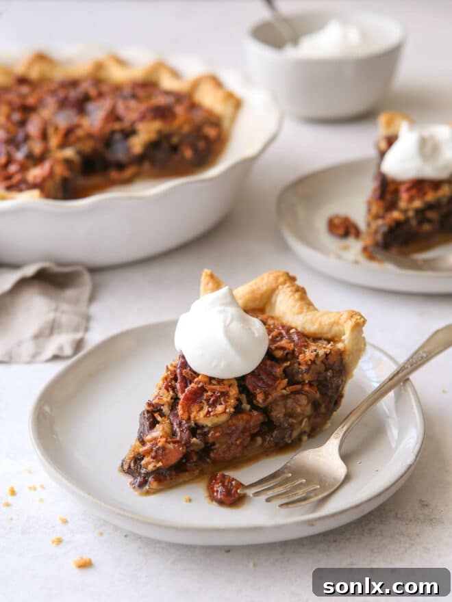 slices of chocolate coconut pecan pie on plates