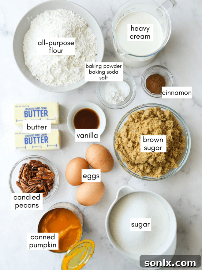 A colorful array of ingredients for pumpkin caramel poke cake laid out on a surface, including flour, sugar, butter, eggs, pumpkin puree, and spices.