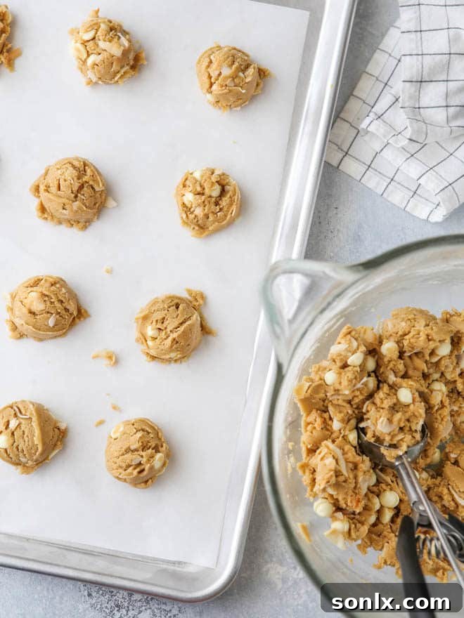 Golden Coconut White Chocolate Chip Cookies 4 Stack of toasted coconut and white chocolate chip cookies