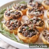 Easy mini mushroom tarts are the perfect winter appetizer!
