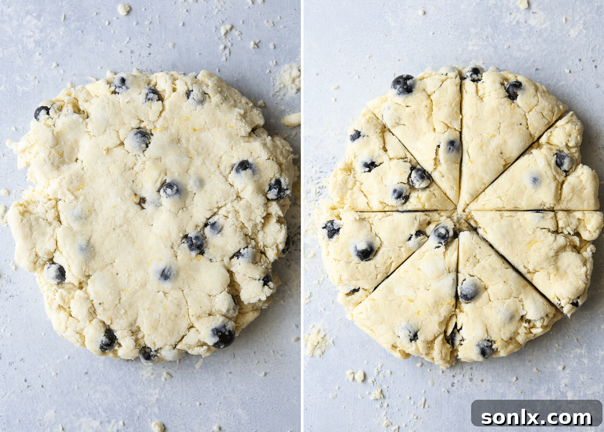 Mixing heavy cream and blueberries into scone dough