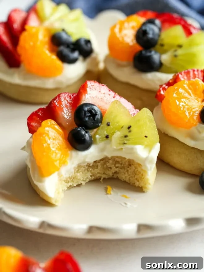 bite taken out of fruit pizza sugar cookie