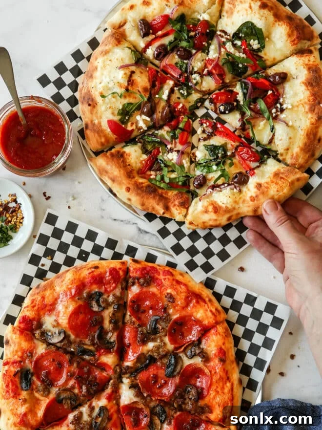 hand grabbing a piece of pizza