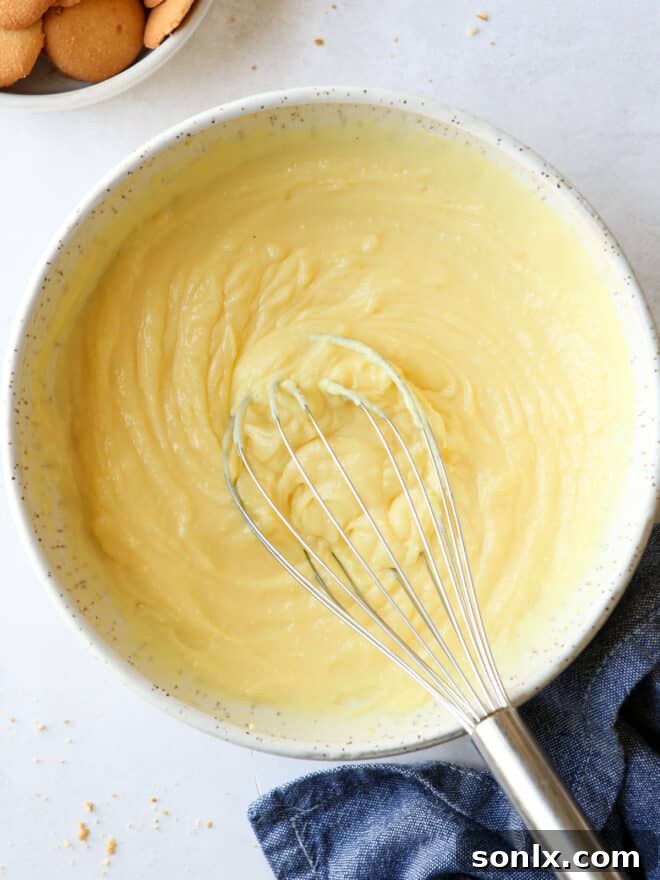 whisked vanilla pudding in white bowl